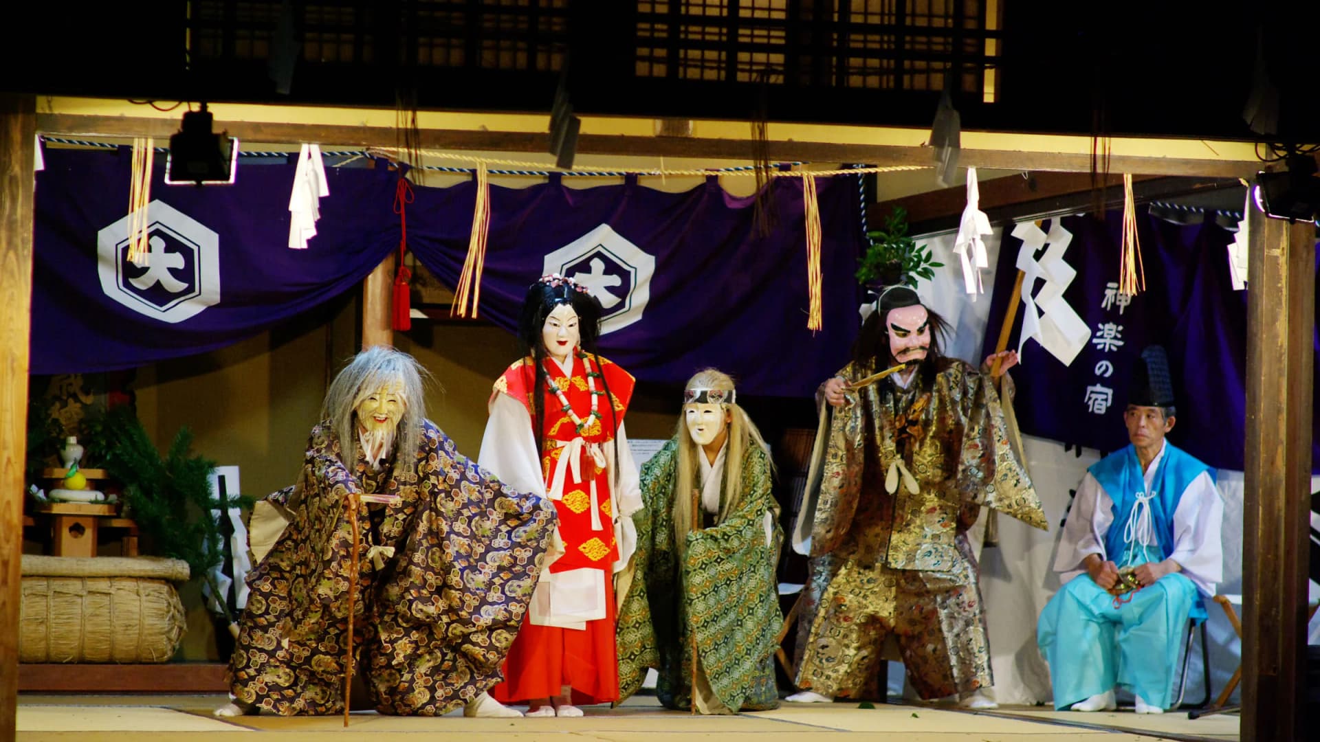 Masked performers on a shrine stage, Shimane