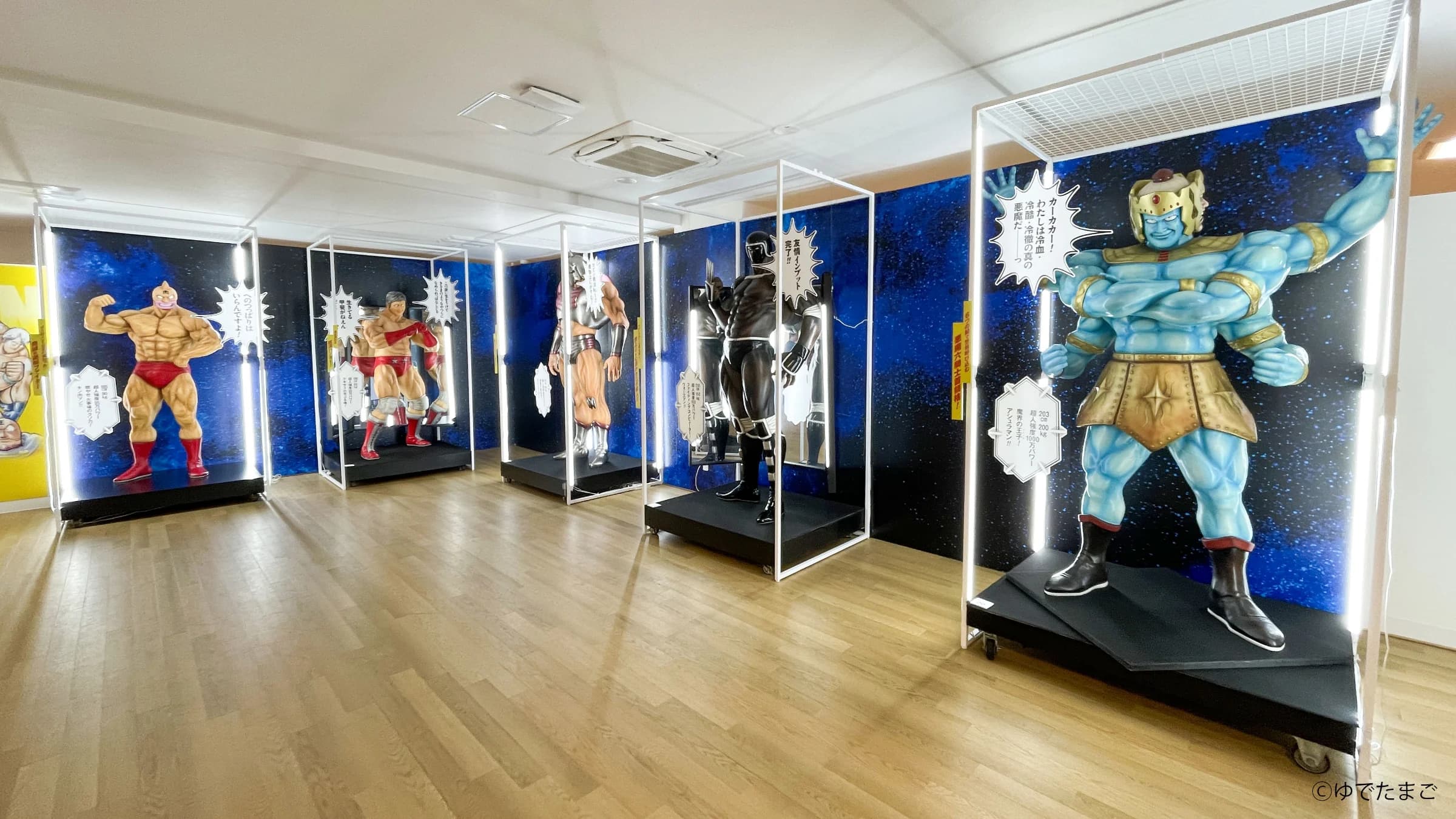 Life-size figures of superhumans — Kinnikuman, Terryman, Robin Mask, Warsman, and Ashuraman — at the Kinnikuman Museum in Numazu