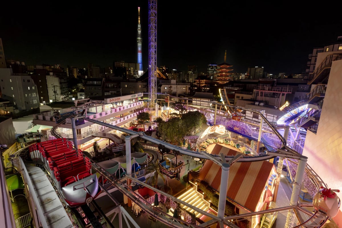 View of Senso-ji Temple and Tokyo Skytree at night from Hanayashiki Park
