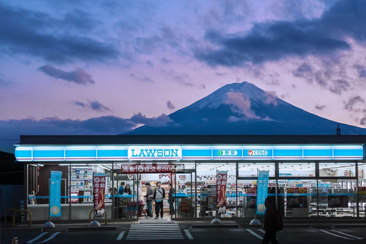 The Lawson convenience store in Fujikawaguchiko with a picturesque view of Mount Fuji in the background.