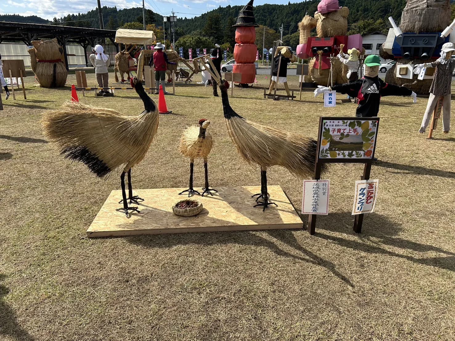 Scarecrow installation “Good at Raising Kids” at the Satomi Kakashi Festival