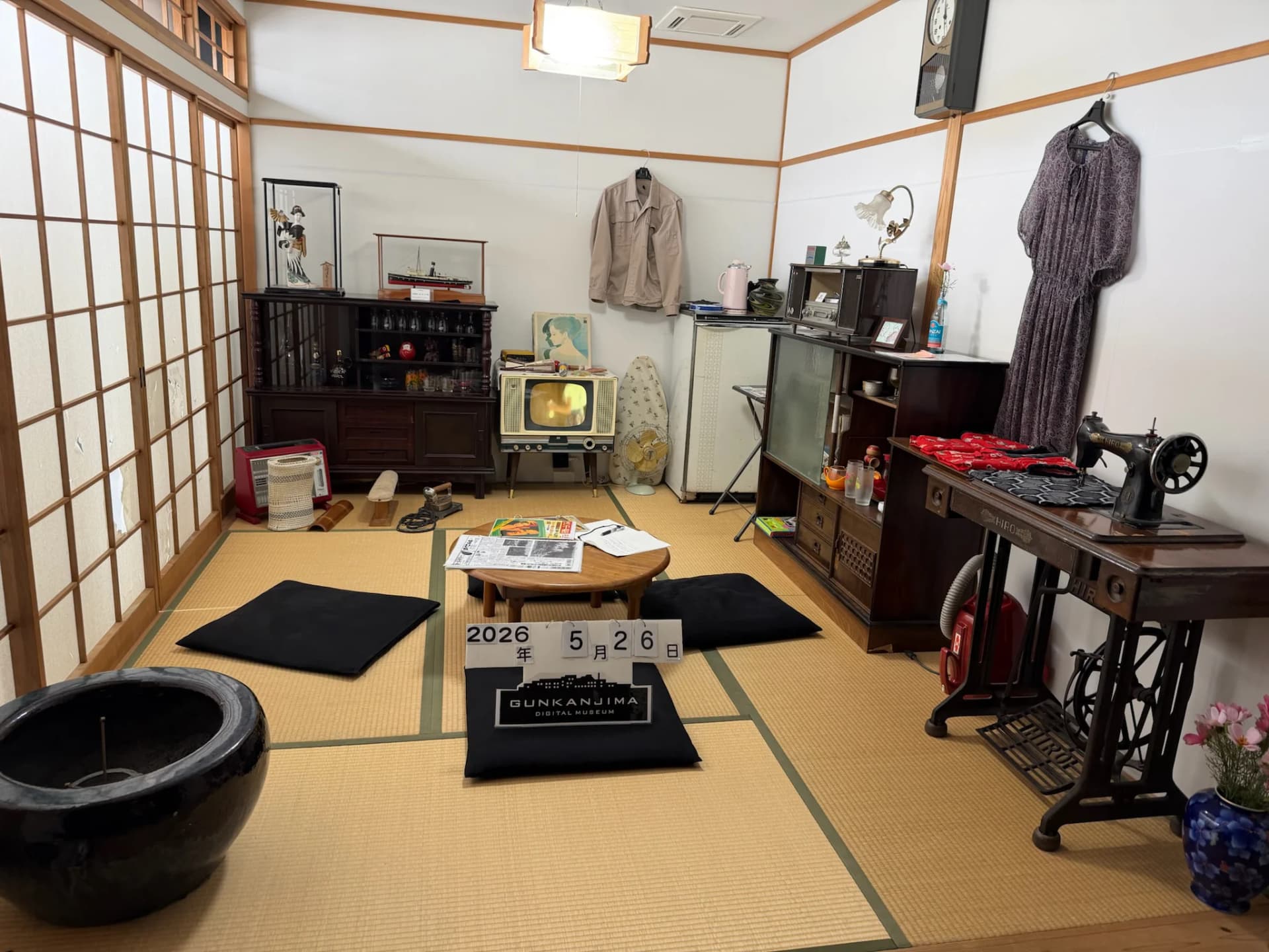 A recreated 1960s tatami living room at the Gunkanjima Digital Museum in Nagasaki
