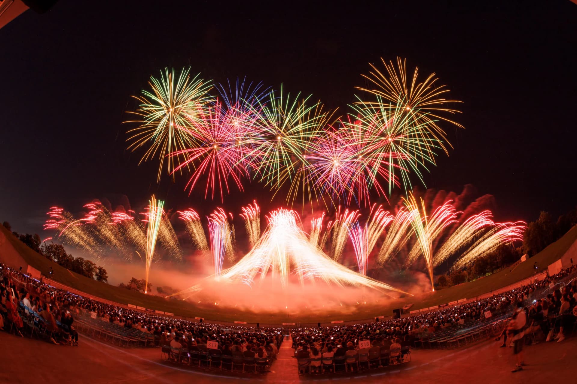 Doshin Akihanabi fireworks illuminate Sapporo's night sky above the Daiwa House Premist Dome