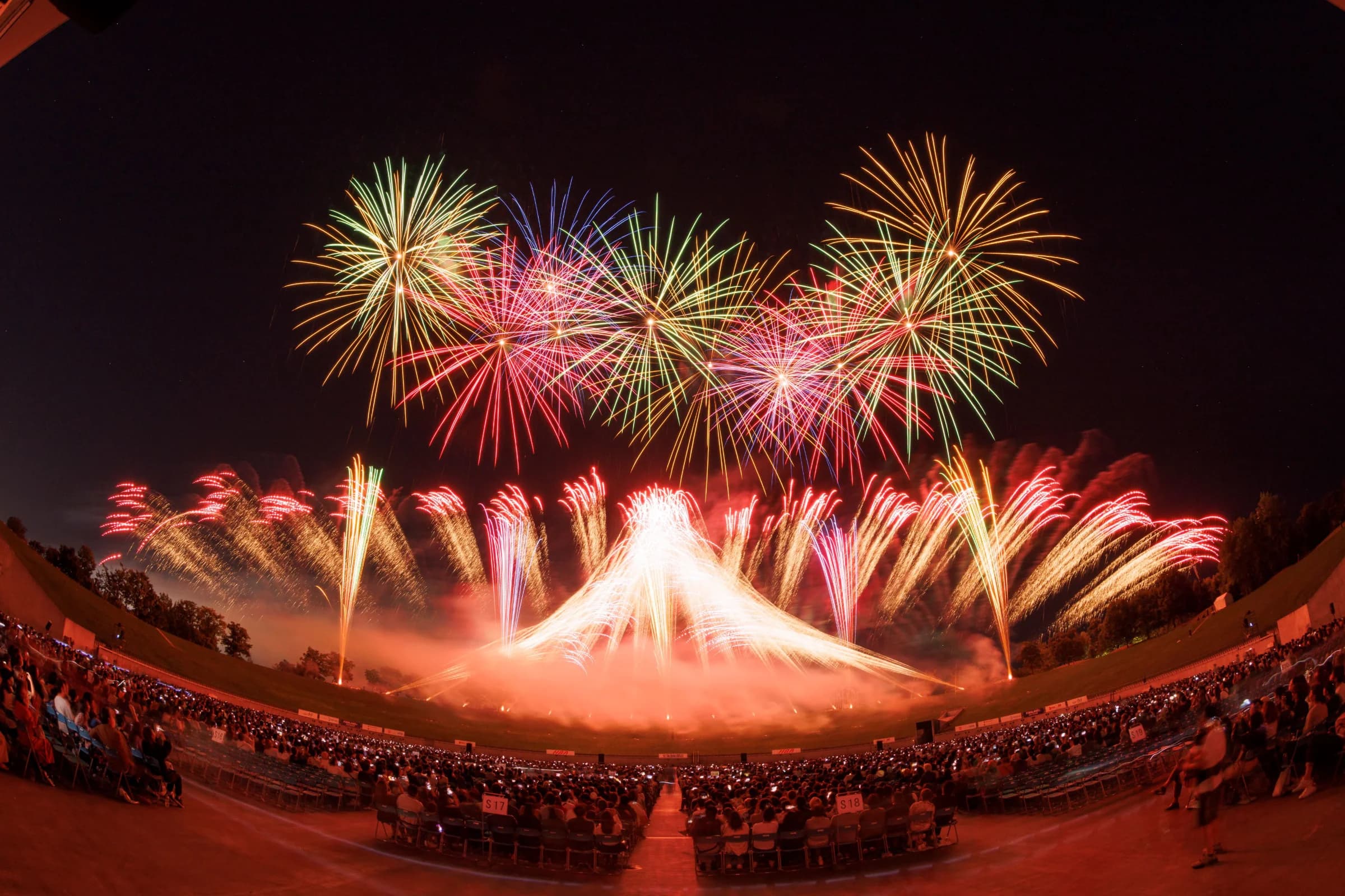 Doshin Akihanabi fireworks illuminate Sapporo's night sky above the Daiwa House Premist Dome