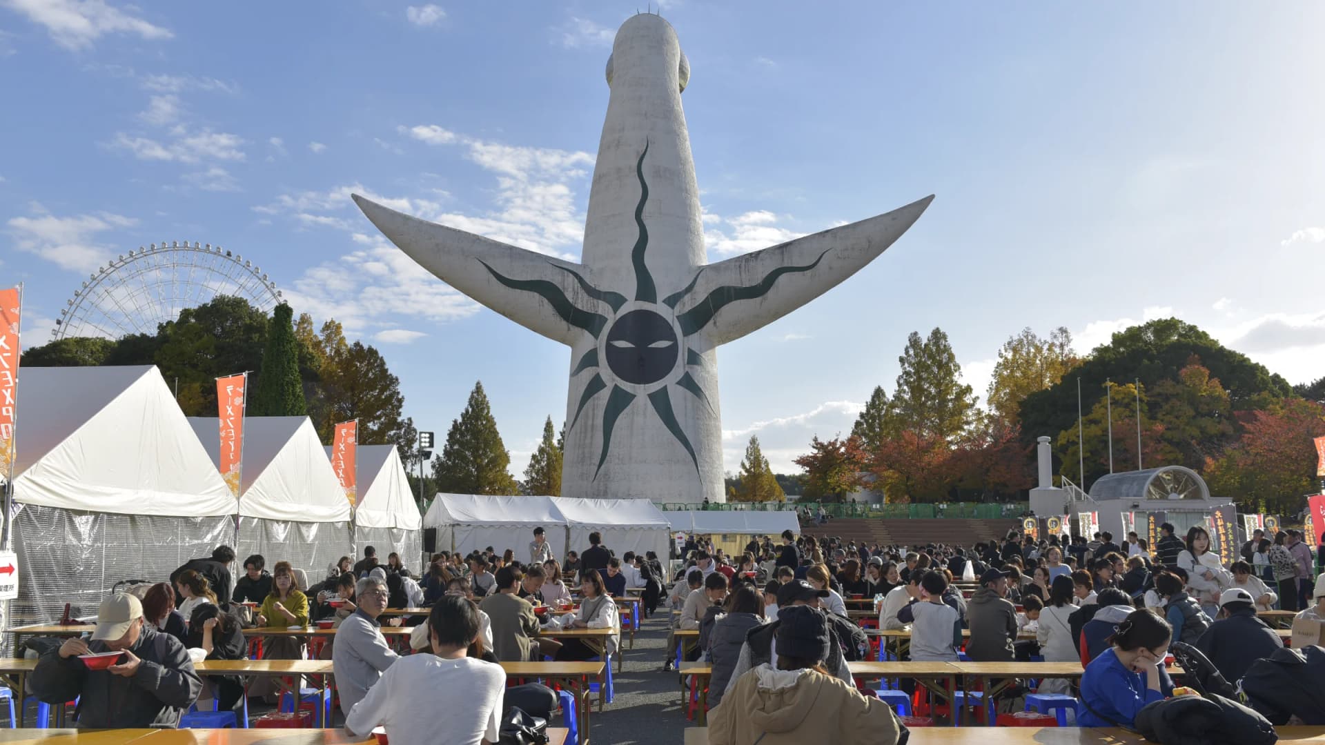 Ramen and food stalls beneath the Tower of the Sun during the daytime programme at "Art Night in the Sky, Expo '70 Commemorative Park"