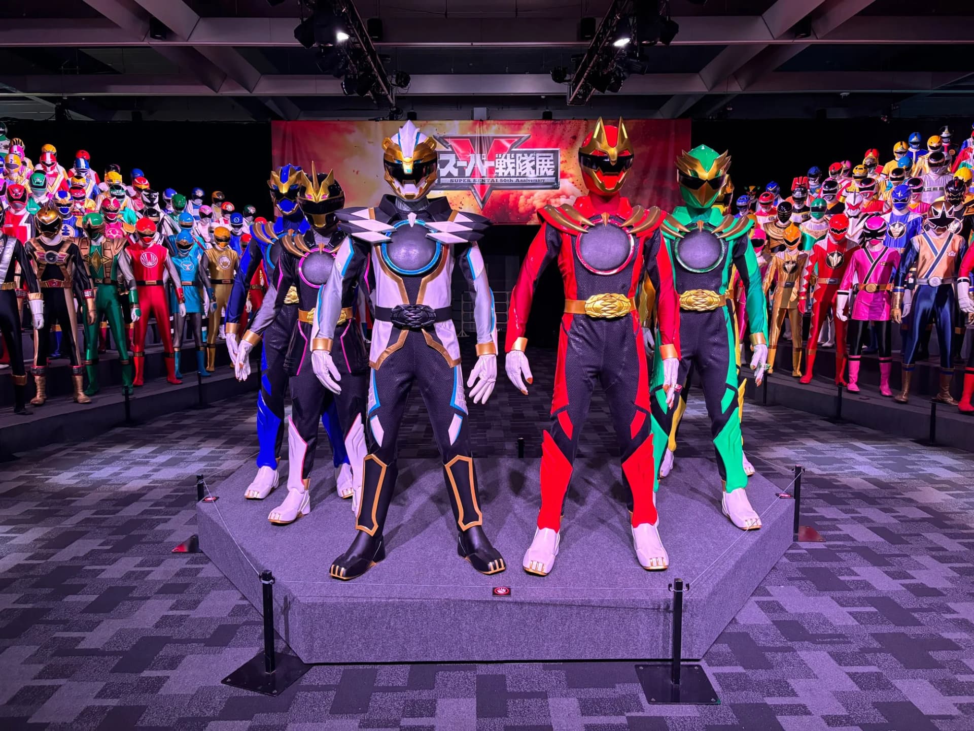 The heroes of Number One Sentai Gozyuger at the front of the full-roster display