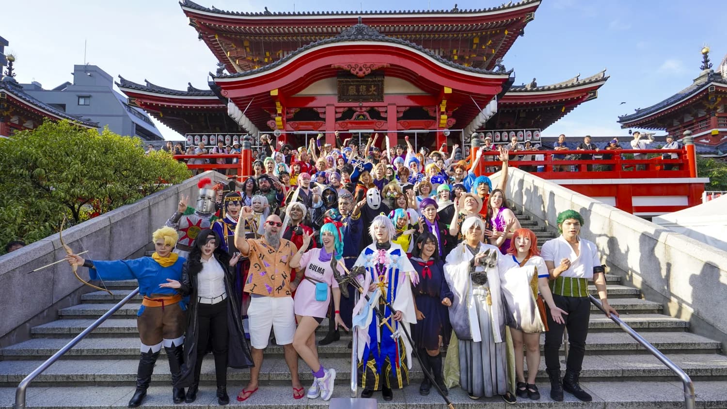 Cosplayers gathered on the steps of Osu Kannon during the Osu Cosplay Parade, World Cosplay Summit 2026, Nagoya, Aichi