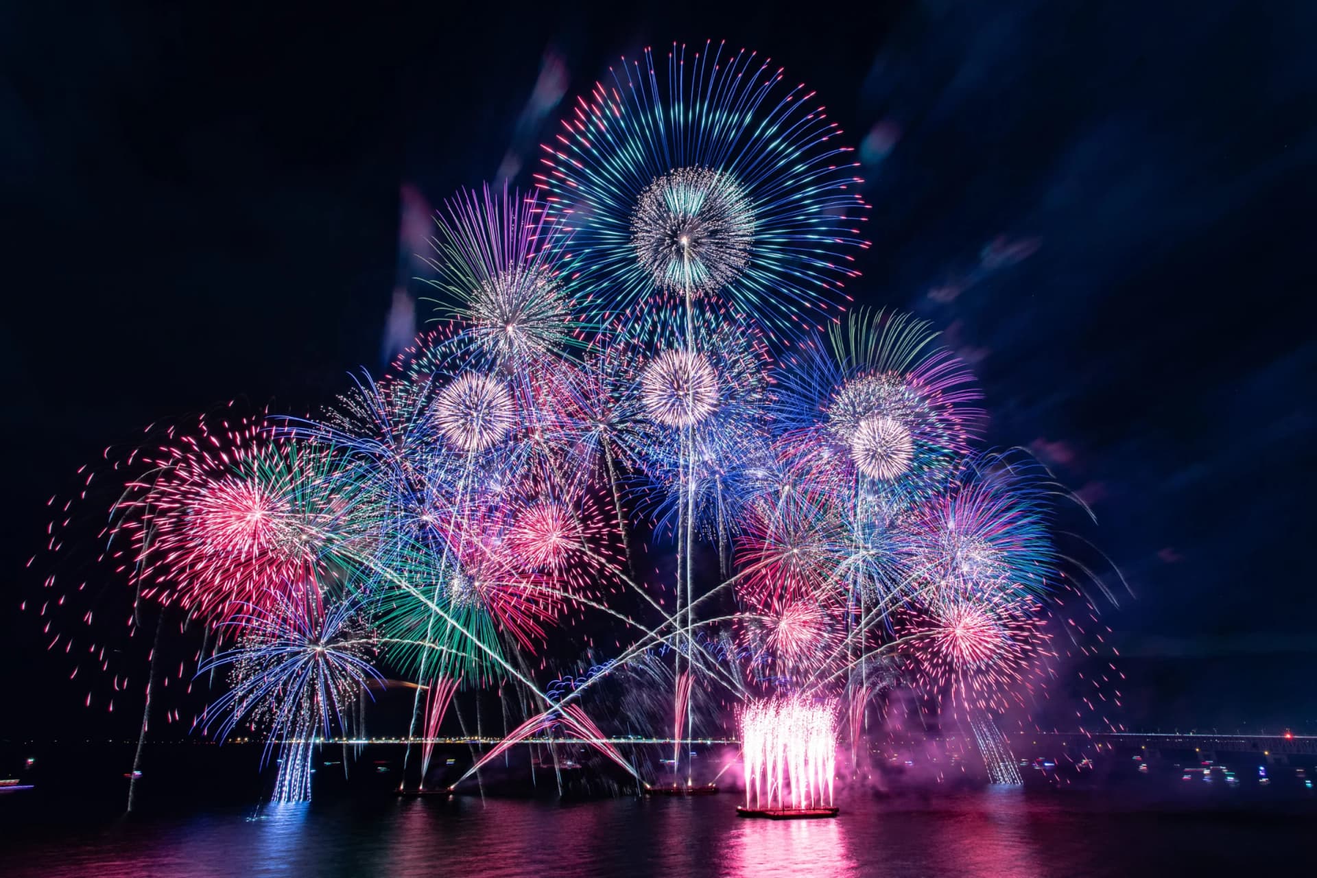 Multicoloured fireworks burst over Osaka Bay at a previous Osaka Art Fireworks event