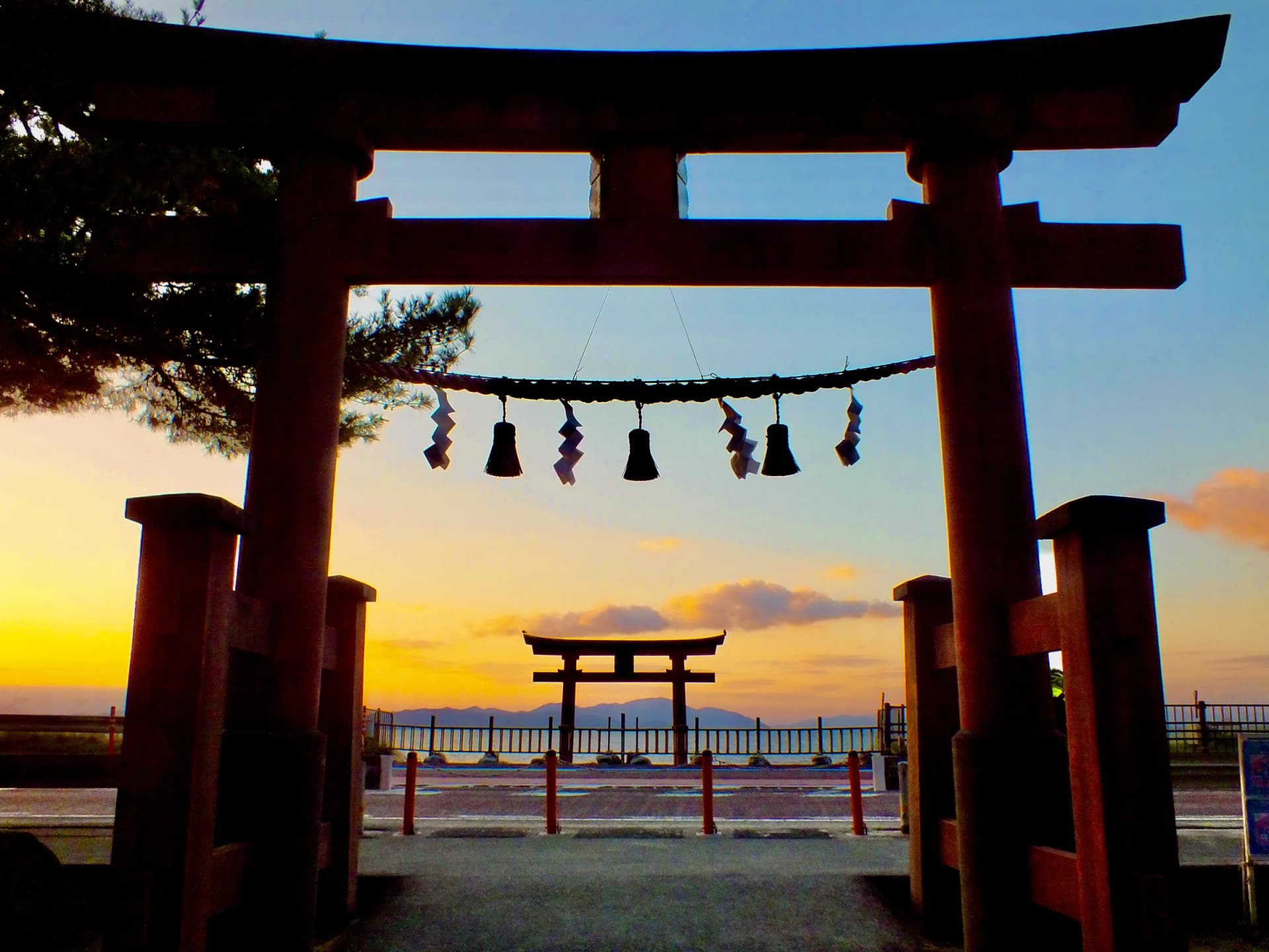 The lake torii framed by the shrine's torii, Shirahige Shrine, Takashima, Shiga