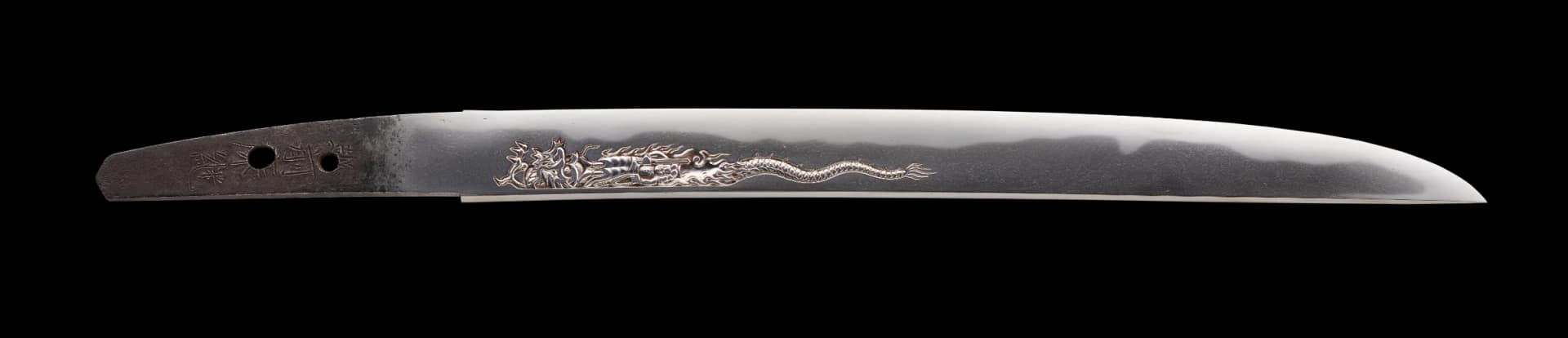 Tanto with a carved dragon, signed Echizen Yasutsugu