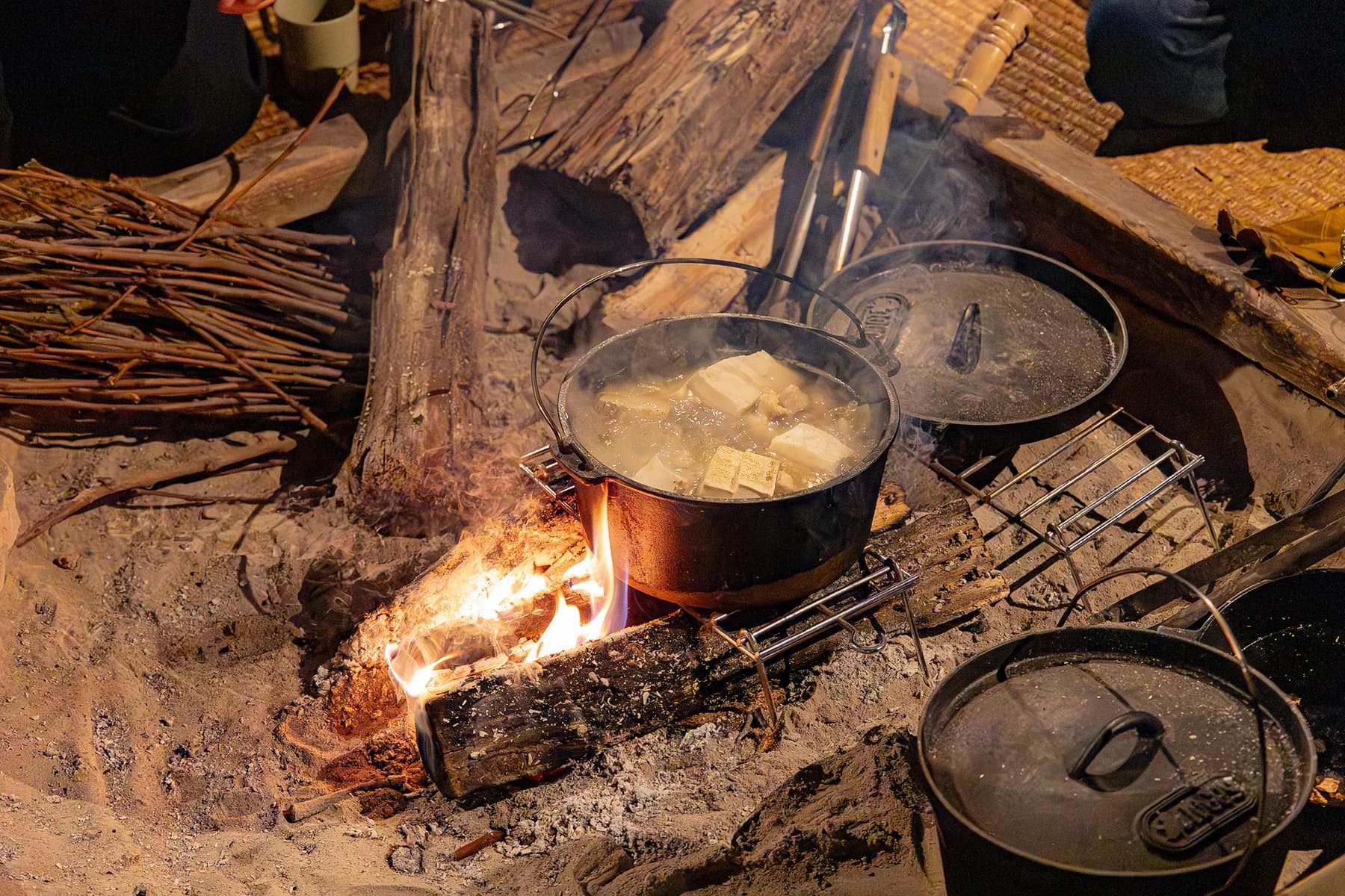 Meals served around a traditional irori fireplace