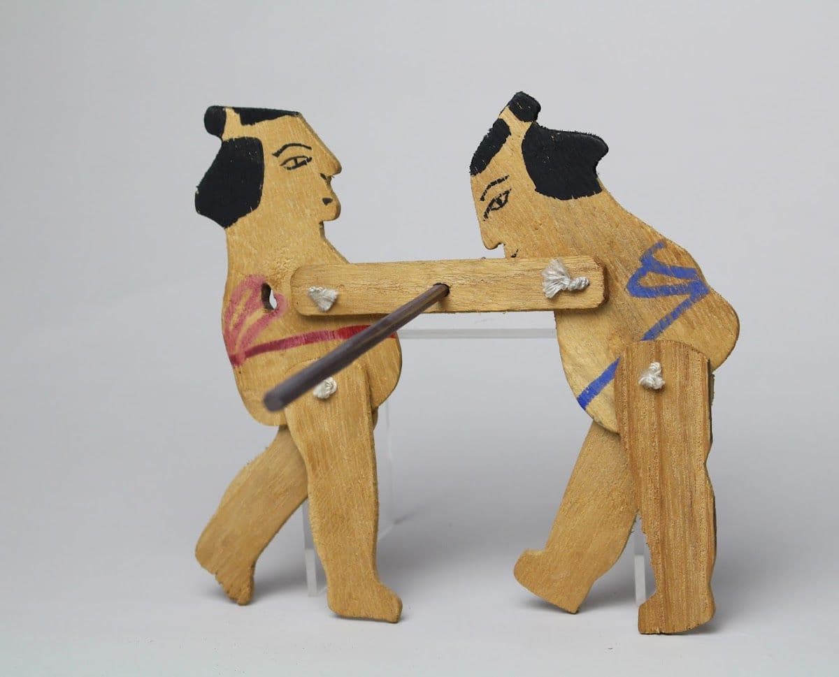 Two Fighting Sumo Wrestlers - a Toy